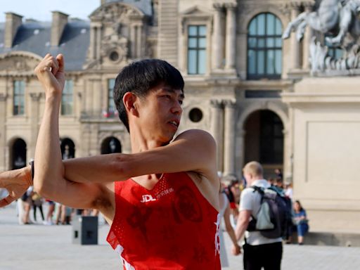 Marathon-Chinese runner ready to deliver alongside the pros in Paris