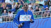 Why Snoop Dogg is back at the Olympics (and even carrying the Olympic torch)