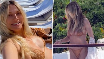 Heidi Klum soaks up some sun in a sparkling gold bikini in France: ‘Jet-lagged, ready to get a tan’