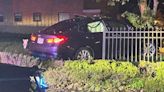 Police chase ends in crash into fence and yard