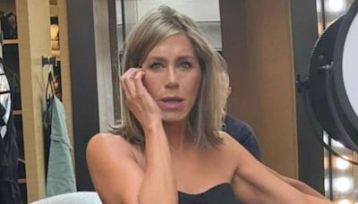 Jennifer Aniston looks younger than ever in plunging dress for very rare selfie