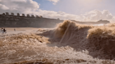 VIDEO: Monster River Wave Surfing in Portugal