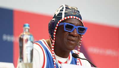 US Olympian's sister-in-law died after traveling to Paris. She left a special gift for Flavor Flav