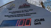 Olympic Torch is lit as countdown for Paris Games hits 100-day mark