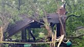 Toddler killed and mother injured as tornado sends tree crashing into their home in Detroit area