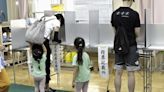 Voters in Tokyo cast ballots to decide whether to reelect incumbent conservative as city’s governor