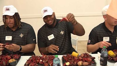 WATCH NOW: Saints rookies try to tackle crawfish for the first time