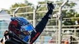 Red Bull Racing's Dutch driver Max Verstappen celebrates winning the pole position after the qualifying session for the Miami Formula One Grand Prix