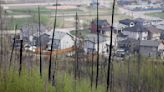 Canadians are hopeful shifting winds may push wildfire away from the oil sands hub of Fort McMurray
