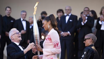 Alfombra roja olímpica en Cannes: la antorcha de París 2024 ilumina el Festival
