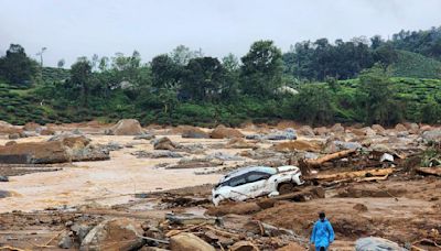 Landslides caused by heavy rains kill 93 and bury many others in southern India