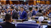 Opposition stages walkout after two MPs were ejected over sensitive remark