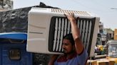 Indians battle intense heat with 'mad rush' for air conditioners, beer