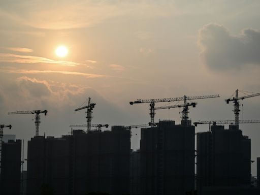 China megacities ease homebuying rules to boost property market