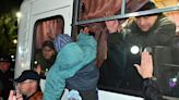Russian reservists leave behind sobbing relatives, new brides