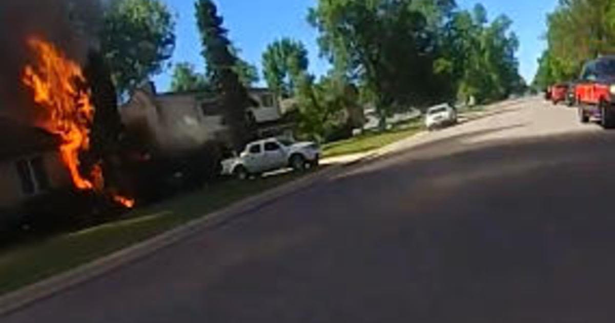 Body cam video shows Colorado deputy rushing inside burning home to evacuate residents inside