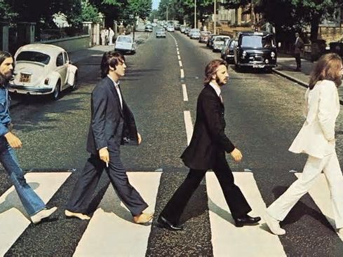 Hidden meaning behind The Beatles' iconic Abbey Road album cover and 'mystery man' in background