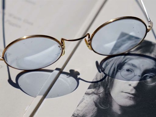 Blue-tinted glasses given by John Lennon to be auctioned with Abbey Road photos