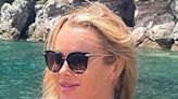 Amanda Holden sizzles in tiny string bikini - and Elizabeth Hurley approves