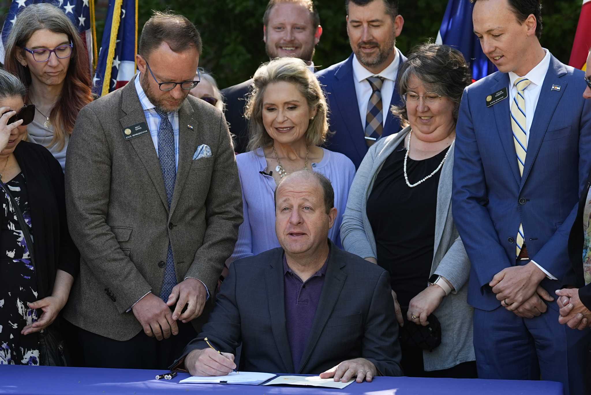 Colorado governor signs bills regulating funeral homes after discovery of 190 rotting bodies