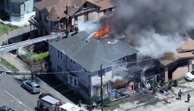 Oakland fire crews knock down house fire near Laney College