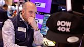Stock market today: Nasdaq touches new record, Dow struggles to top 40,000 again