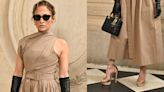 Jennifer Lopez Goes Glam in Jimmy Choo Gold Platform Sandals and Belted Dress at Dior Fall 2024 Couture Show