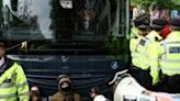 Police were called after the protesters tried to block a bus believed to be taking migrants from a hotel in south London