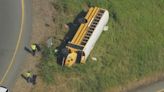 Bus full of children, 1 driver rolls over in Burlington