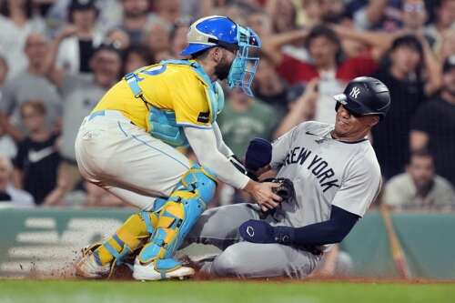 Torres’ two-run double in 10th helps Yankees rally past Red Sox 11-8