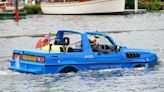 Amphibious cars take to the Thames for Traditional Boat Festival