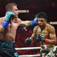 Saul 'Canelo' Alvarez lands a left against Jaime Munguia on the way to a unanimous decision victory in their super-middleweight world title fight in Las Vegas