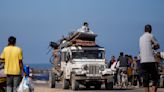 Palestinians flee chaos and panic in Rafah after Israel's seizure of border crossing