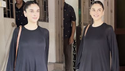 Aditi Rao Hydari proves she loves all things minimal as she makes a fashion statement in black dress and sneakers in Mumbai; WATCH