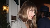 Taylor Swift Accents Her Baggy Suit Look With Pops of Red While in London