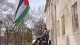 Palestinian flag is raised over Harvard statue where American flag was