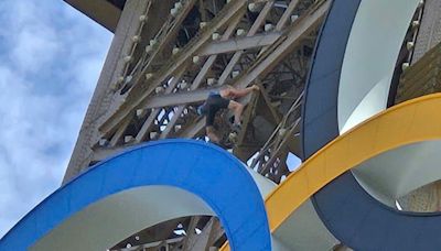 Eiffel Tower evacuated after man seen climbing hours before Olympics closing ceremony