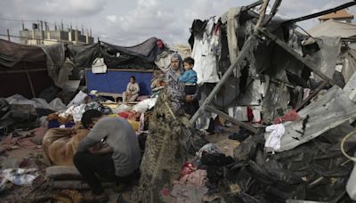 At least 25 dead as Israel pounds camps near Rafah in Gaza