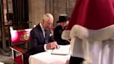 King Charles III signs visitors’ book in Llandaff Cathedral with own fountain pen