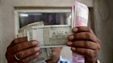 Rupee higher before budget, but risks seen on more weakness