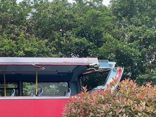 Kent: Man arrested as four children remain in serious condition in hospital after tractor and bus crash