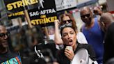 AOC Hits Picket Lines With Striking Actors & Writers In NYC: “How Many Private Jets Does David Zaslav Need?”