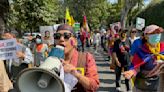 Hundreds of Tibetans march on New Delhi streets asking China to leave Tibet on uprising anniversary