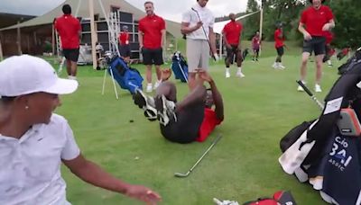 Bukayo Saka shows off golf swing before taking hilarious tumble in front of England teammates