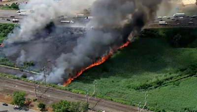 Raging brush fire extinguished after slowing traffic on I-95, approached nearby warehouse