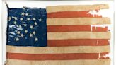 A 19th century flag disrupts leadership at an Illinois museum and prompts a state investigation
