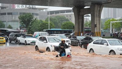 China issues top rainstorm alert as deadly flooding moves north