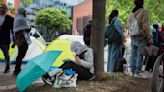 Anti-war protesters dig in as some schools close encampments after reports of antisemitic activity