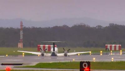 A plane with 3 aboard lands without landing gear at an Australian airport after burning off fuel