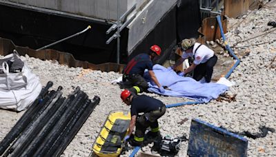 1 dead, 1 critically injured after falling about 9 stories from scaffold at construction site on South Side